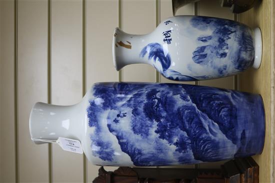 A Chinese blue and white baluster vase, decorated with a landscape, Largest 17.25in.